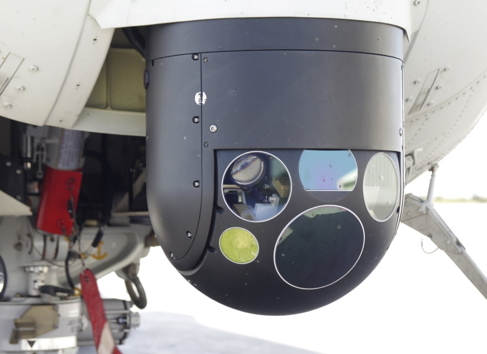 A FLIR camera mounted on an EH101 utility helicopter Canvas Art - Timm ZiegenthalerStocktrek Images (33 x 24)