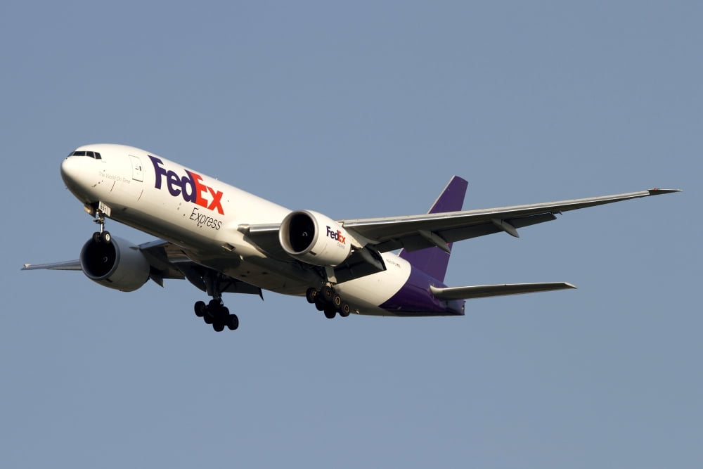 A Federal Express Boeing 777F cargo plane Canvas Art - Luca NicolottiStocktrek Images (35 x 24)