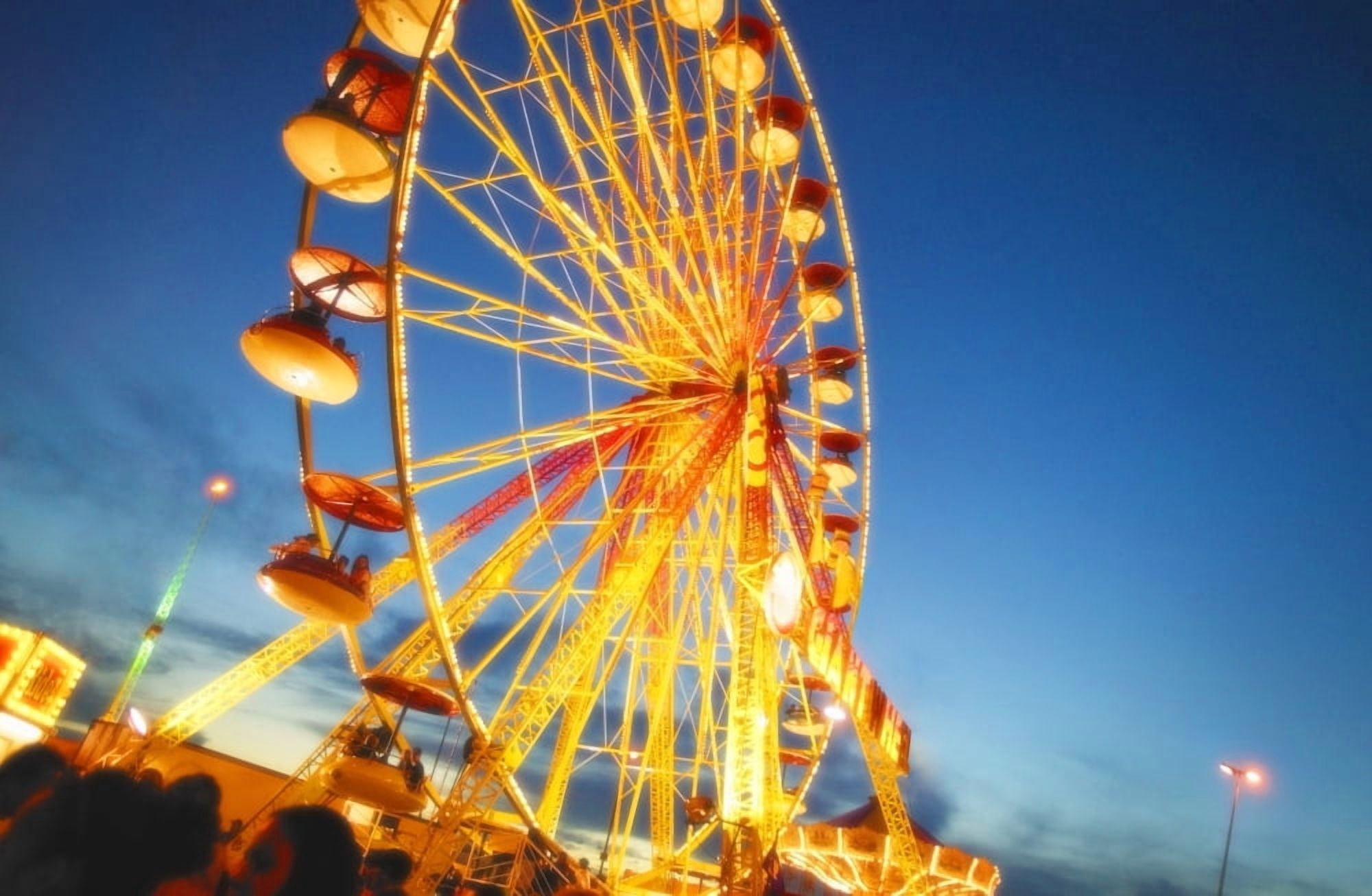 A Ferris Wheel At Night Canvas Art - Don Hammond Design Pics (17 x 11)