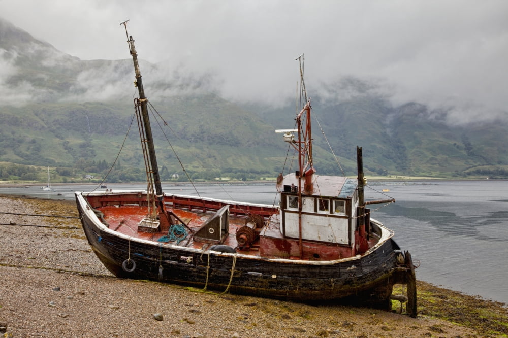 A Fishing Boat Abandoned On The Shore Ardgour Isle Of Mull Scotland Canvas Art - John Short Design Pics (19 x 12)