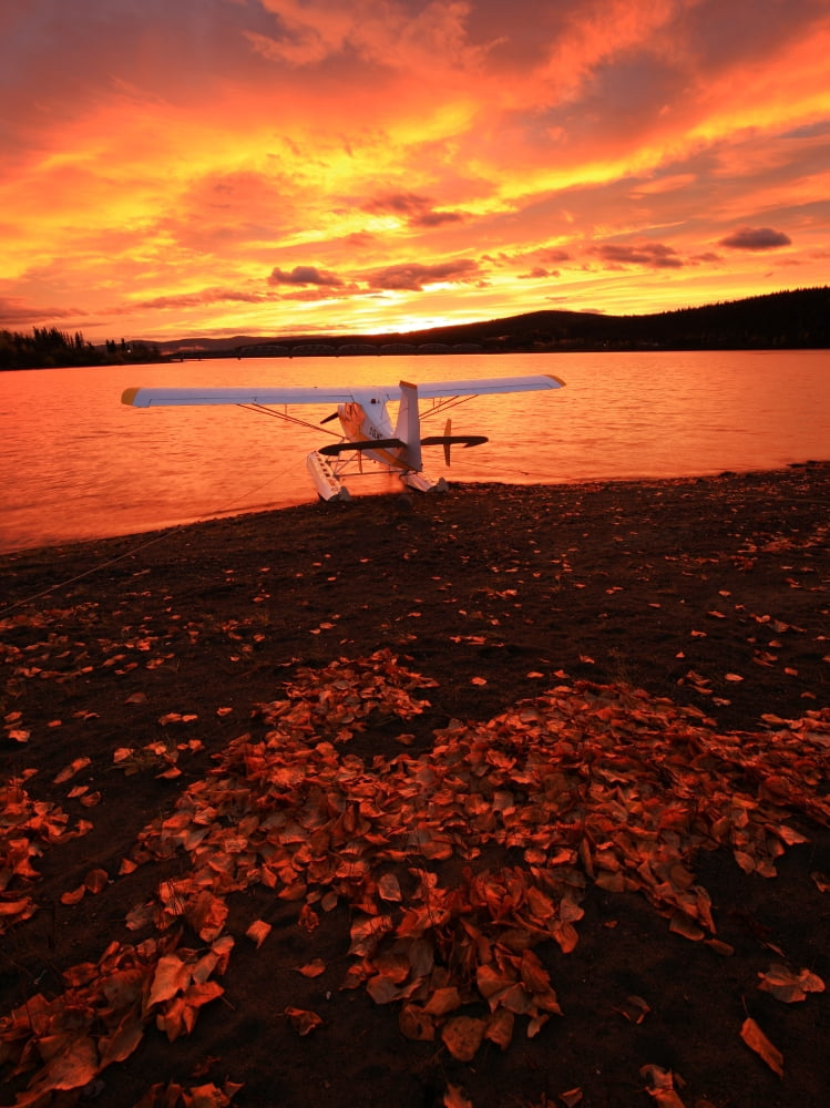 A Float Plane Facing The Sunrise Over Teslin Lake Yukon Canvas Art - Robert Postma Design Pics (24 x 32)
