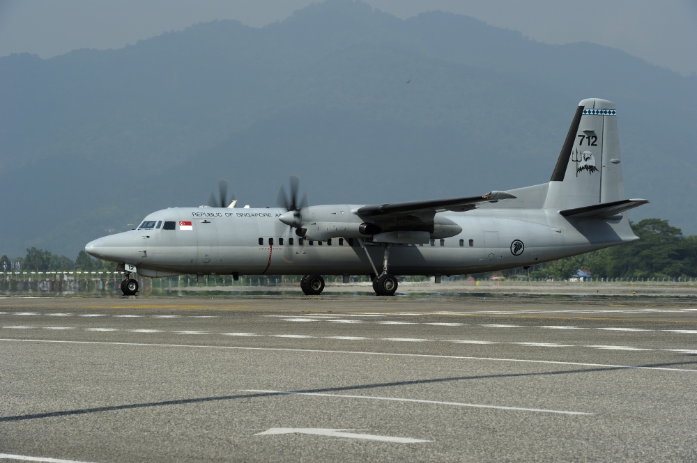 A Fokker F-27 Friendship of the Singapore Air Force at Langkawi Airport Canvas Art - Remo GuidiStocktrek Images (35 x 23)