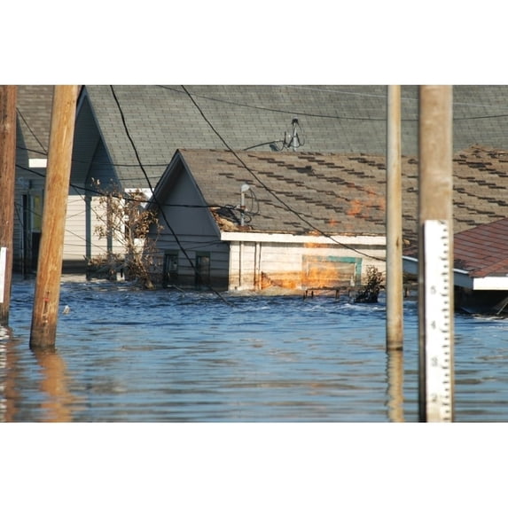 A Gas Fire Burns Next To A New Orleans Home Still Flooded A Week After Hurricane Katrina. Sept. 7 2005. History (