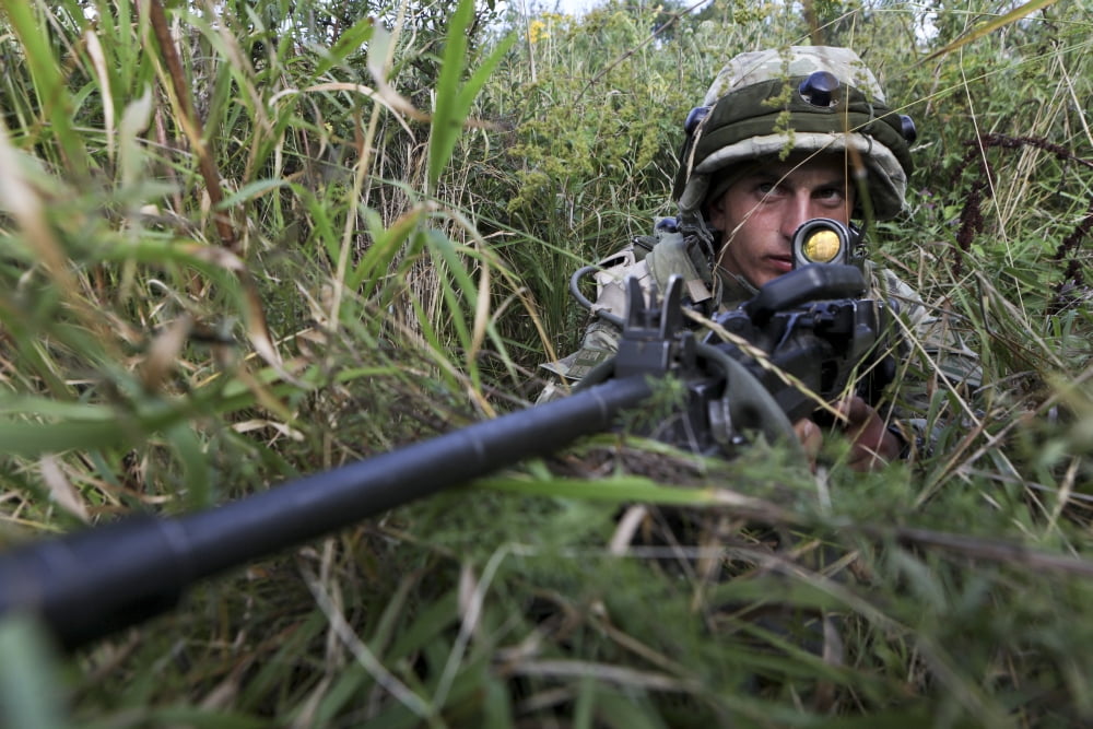 A Georgian soldier provides security Canvas Art - Stocktrek Images (35 x 23)