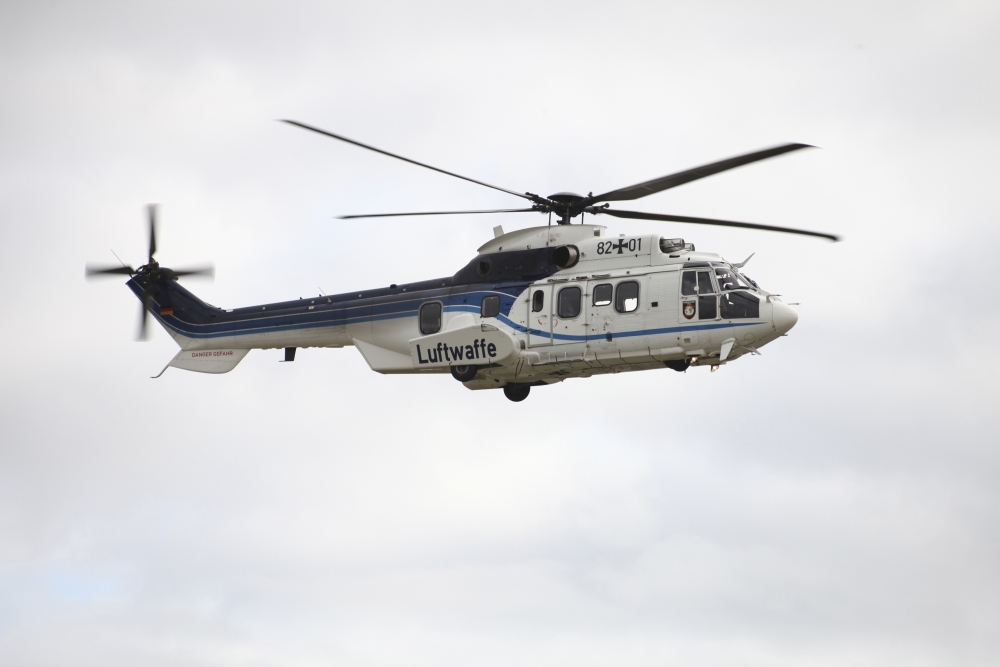 A German Air Force Eurocopter Cougar helicopter used for VIP transport Canvas Art - Timm ZiegenthalerStocktrek Images (18 x 12)