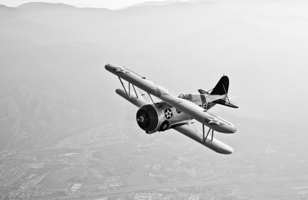 A Grumman F3F biplane in flight Canvas Art - Scott GermainStocktrek Images (18 x 12)
