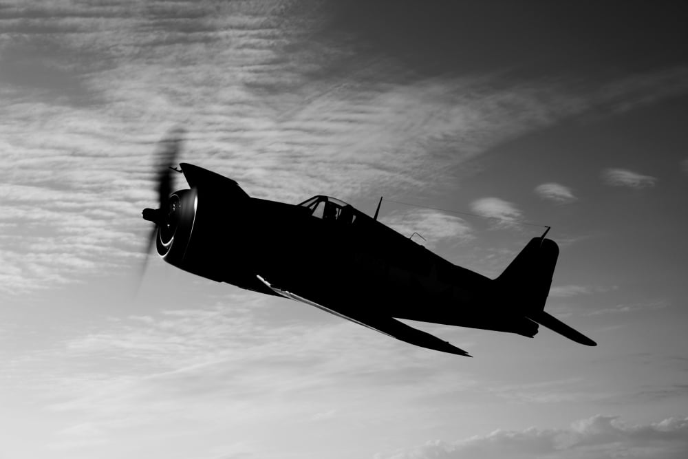 A Grumman F6F Hellcat fighter plane in flight Canvas Art - Scott GermainStocktrek Images (18 x 12)