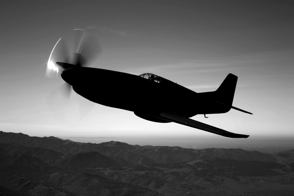 A Grumman F6F Hellcat fighter plane in flight Canvas Art - Scott GermainStocktrek Images (35 x 23)