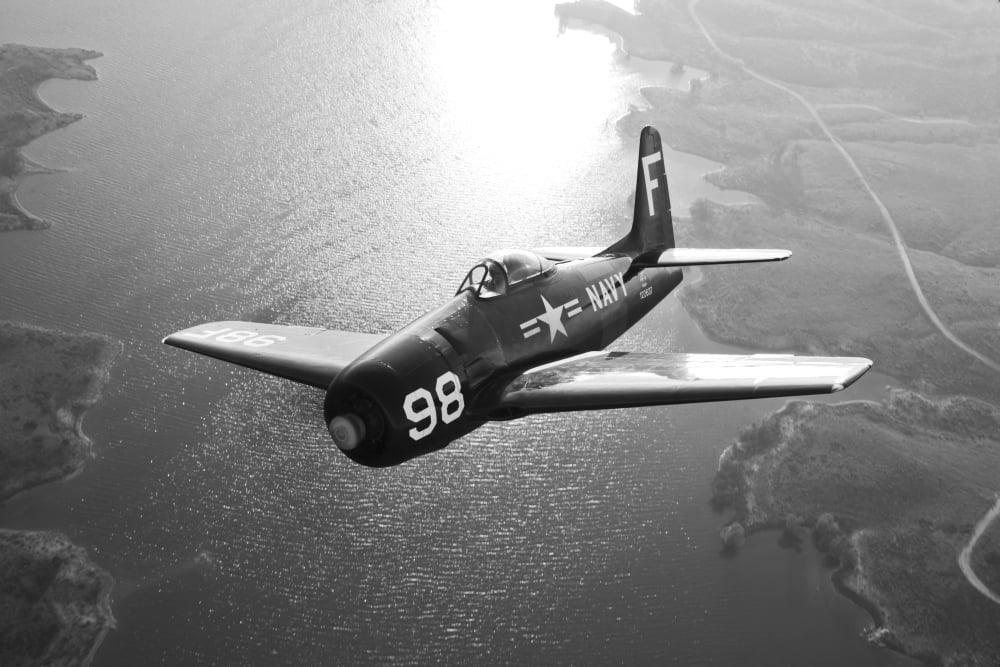 A Grumman F8F Bearcat in flight Canvas Art - Scott GermainStocktrek Images (18 x 12)