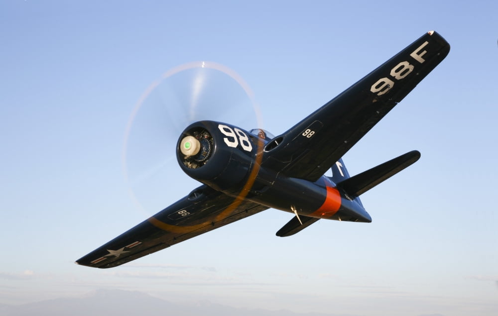 A Grumman F8F Bearcat in flight Canvas Art - Scott GermainStocktrek Images (18 x 12)