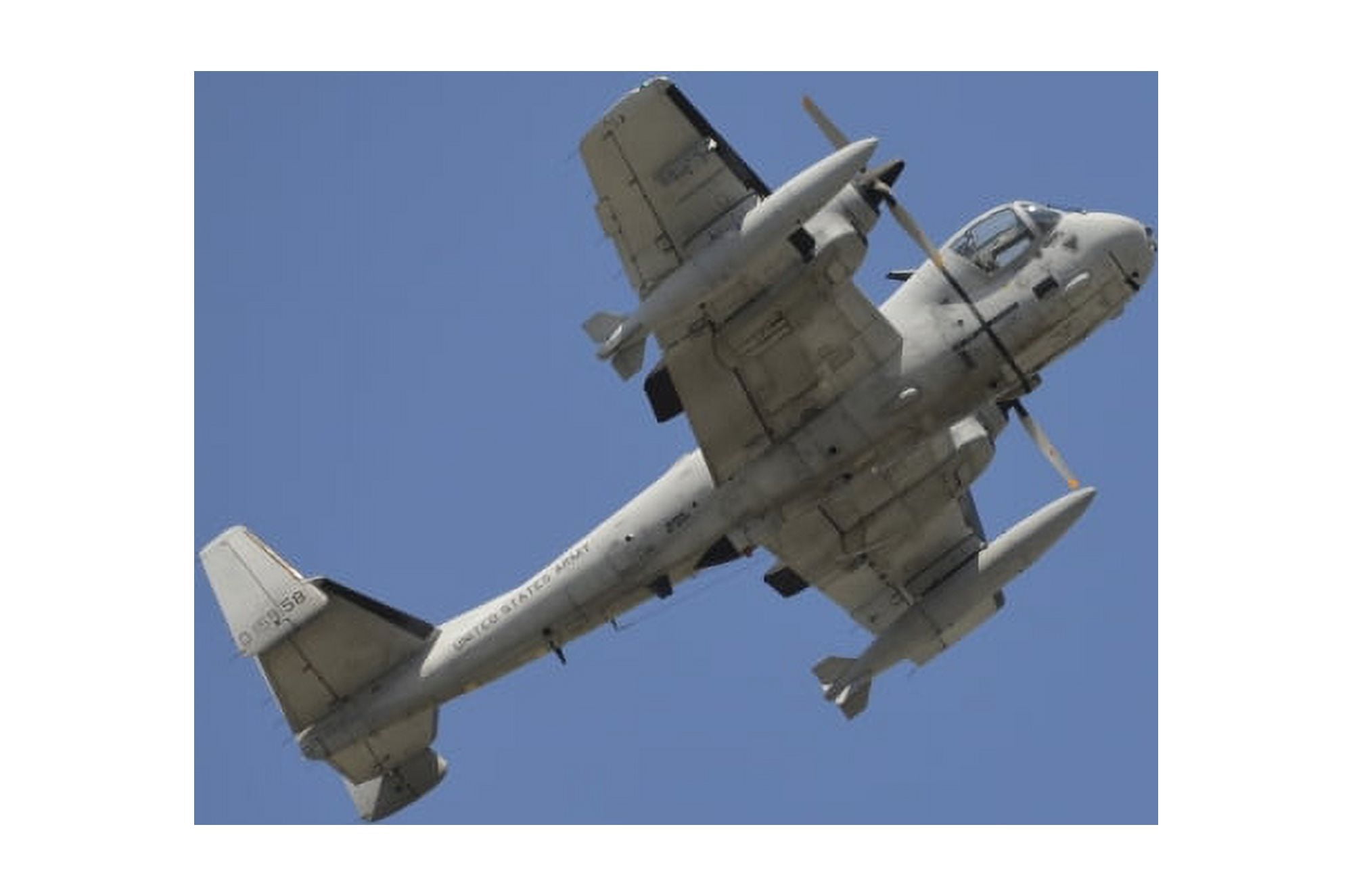 A Grumman OV-1 Mohawk in flight over Florida Canvas Art - Stocktrek Images (35 x 23)