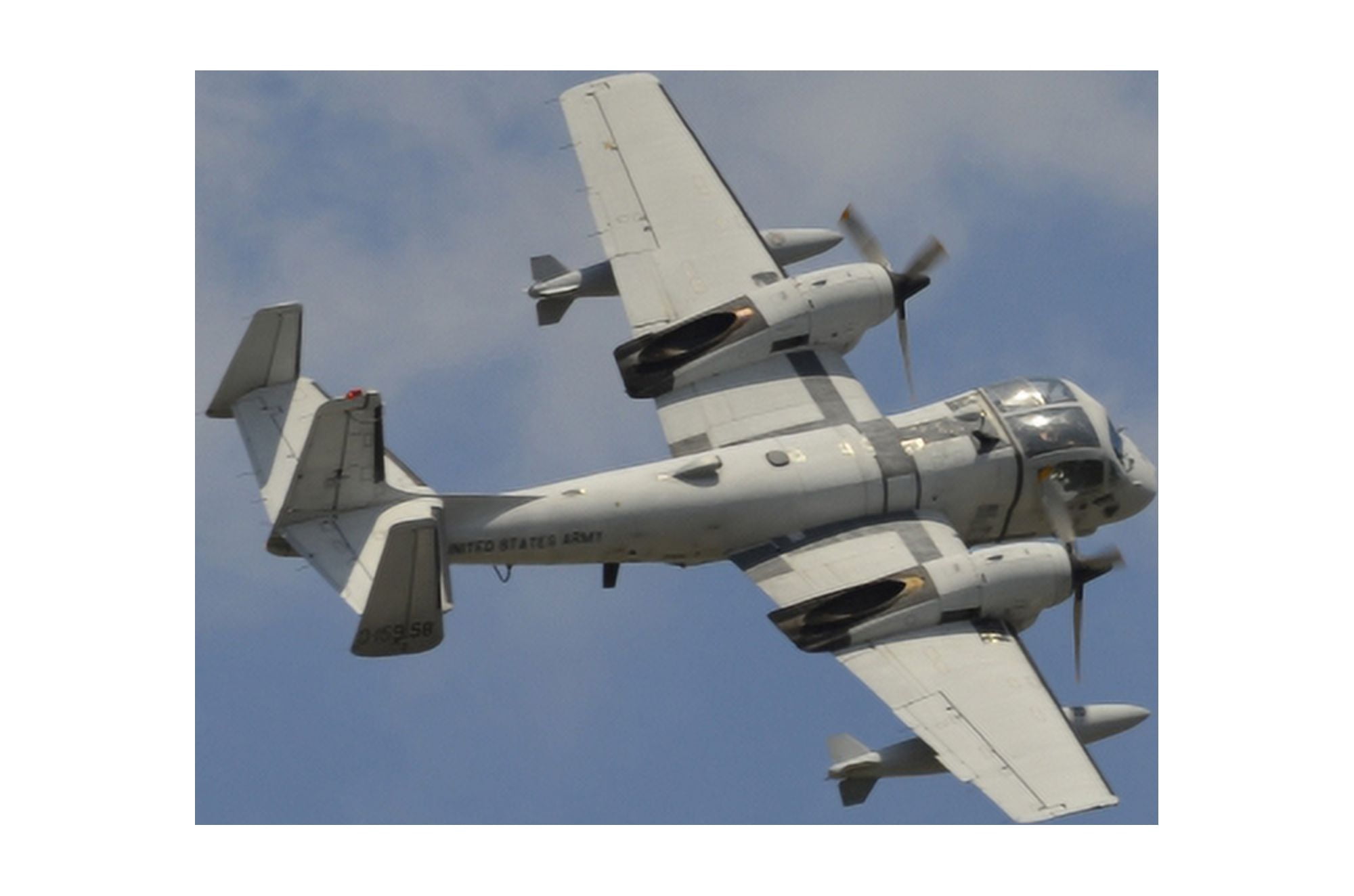 A Grumman OV-1 Mohawk in flight over Florida Canvas Art - Stocktrek Images (35 x 23)