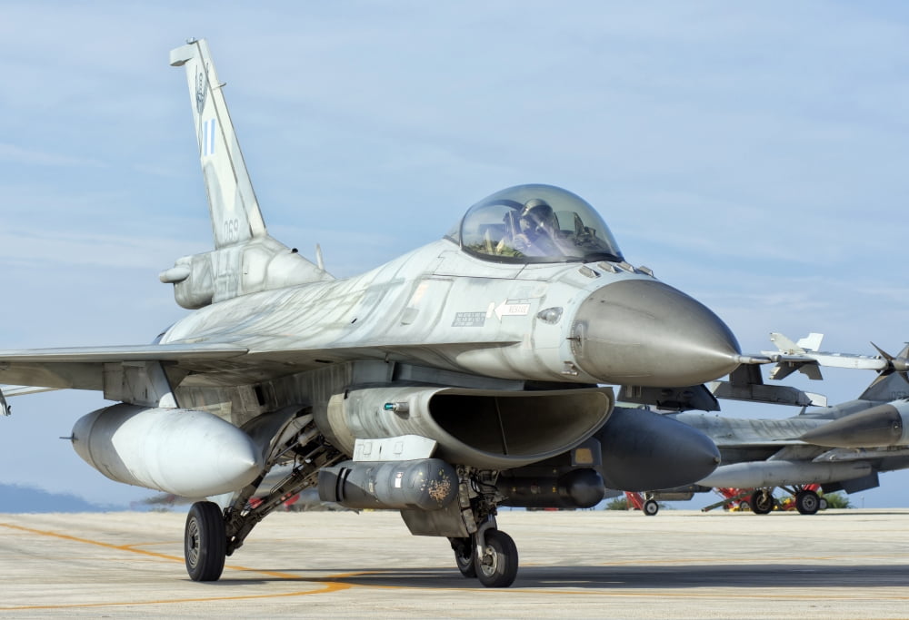 A Hellenic Air Force F-16 taxiing at Trapani Air Base Italy Canvas Art - Giovanni CollaStocktrek Images (17 x 12)