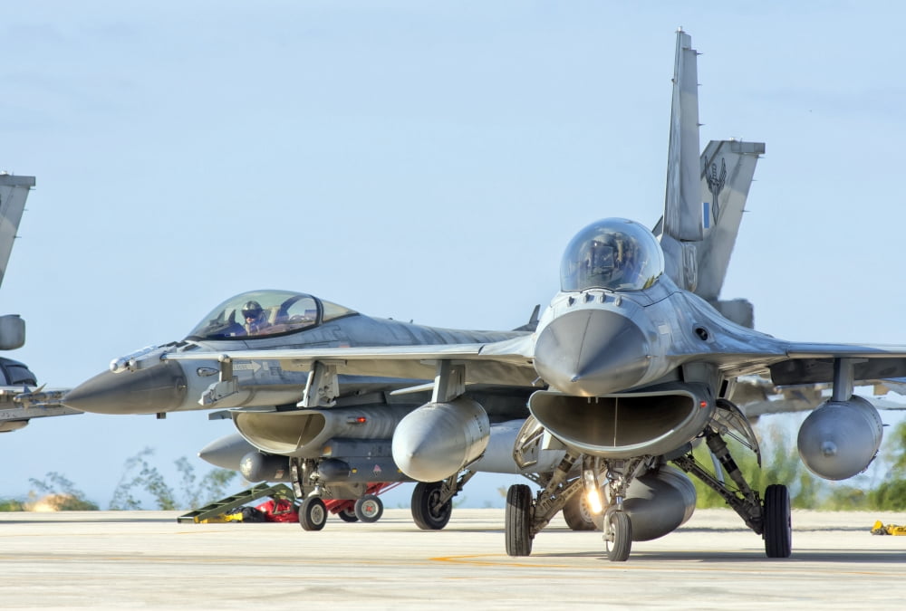 A Hellenic Air Force F-16 taxiing at Trapani Air Base Italy Canvas Art - Giovanni CollaStocktrek Images (17 x 12)