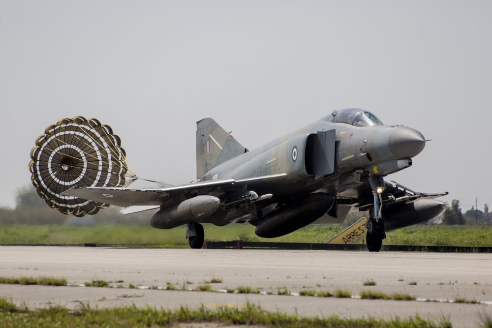 A Hellenic Air Force F-4E Phantom deploys drag chute upon landing Canvas Art - Timm ZiegenthalerStocktrek Images (17 x 12)