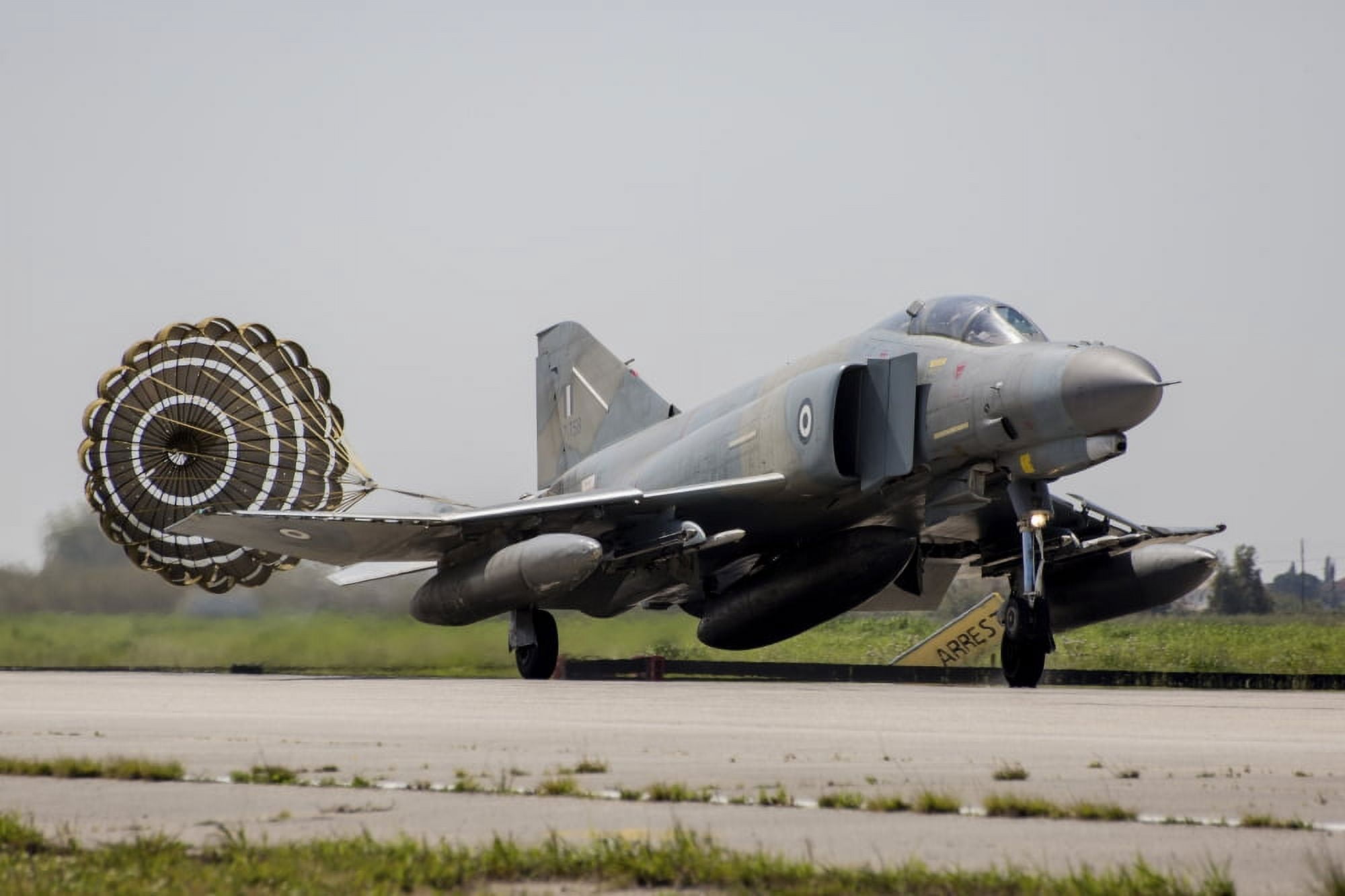 A Hellenic Air Force F-4E Phantom deploys drag chute upon landing Canvas Art - Timm ZiegenthalerStocktrek Images (34 x 23)