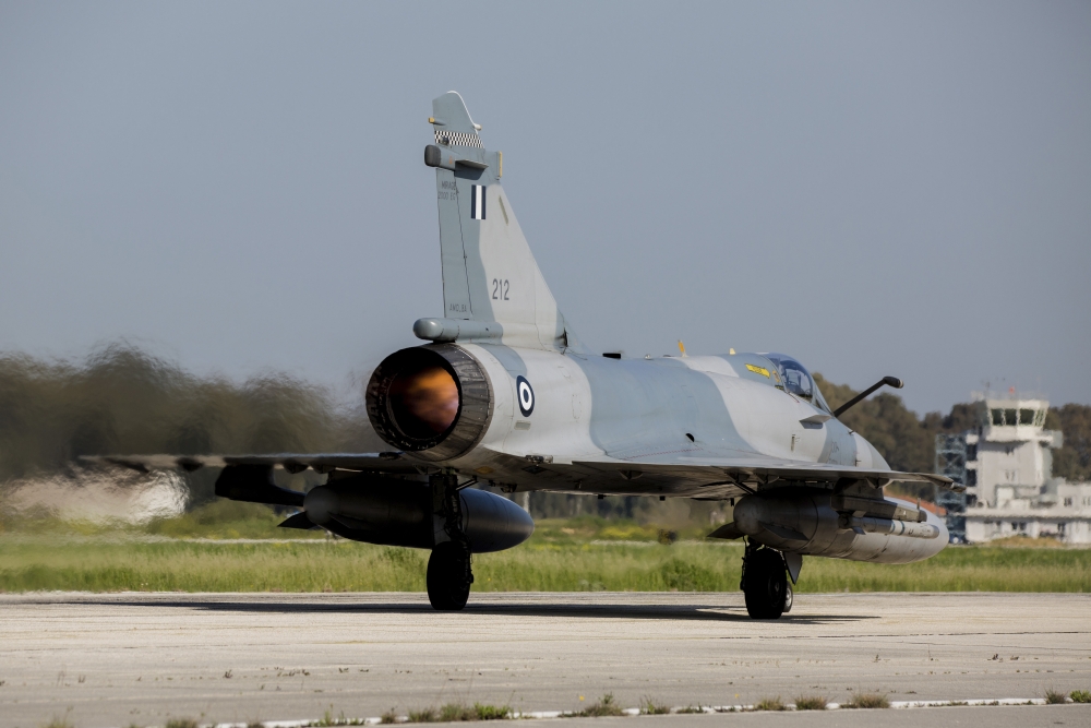 A Hellenic Air Force Mirage 2000 EGM taking off from Andravida Greece Canvas Art - Timm ZiegenthalerStocktrek Images (34 x 23)
