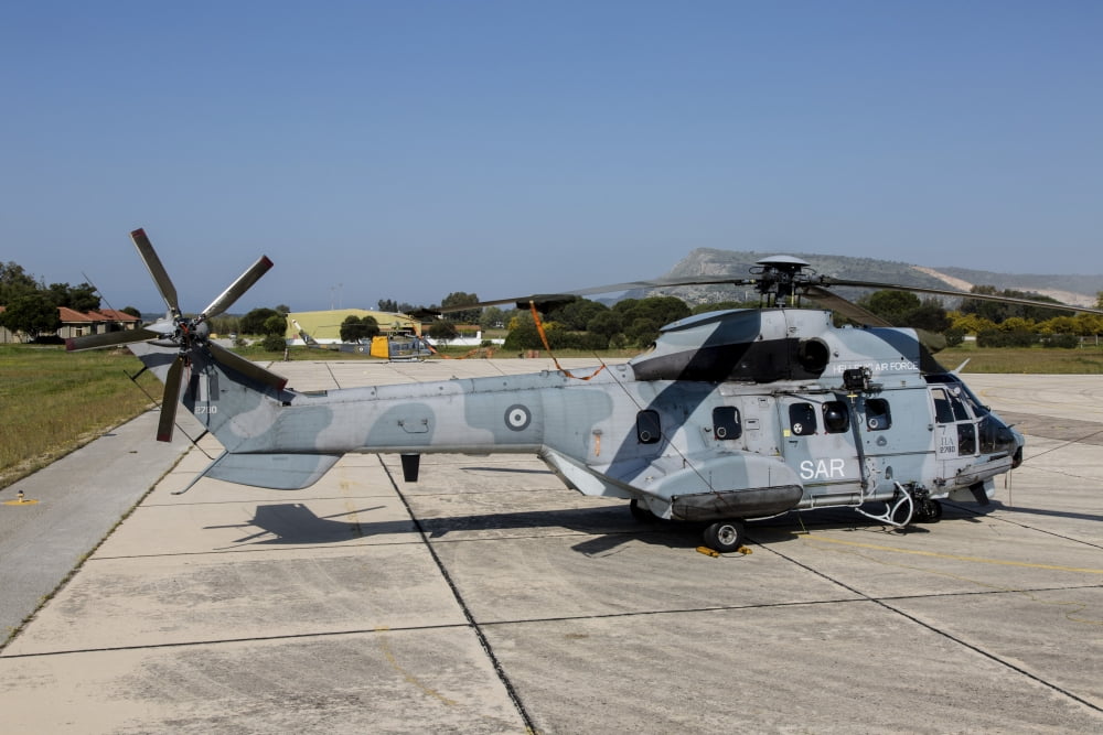 A Hellenic Air Force Super Puma search and rescue helicopter Canvas Art - Timm ZiegenthalerStocktrek Images (34 x 23)
