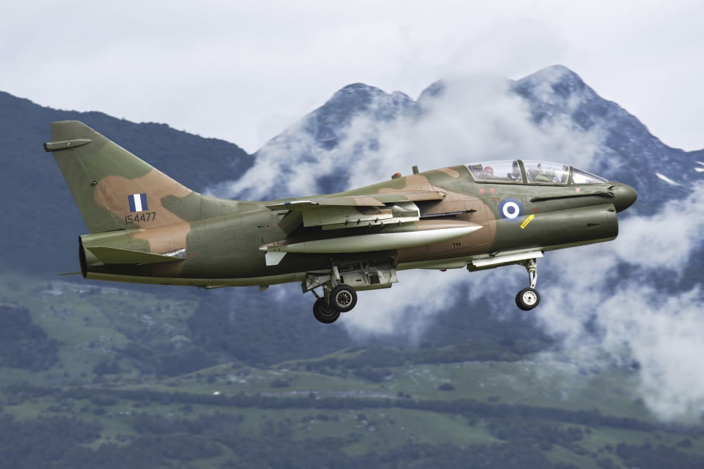 A Hellenic Air Force TA-7C Corsair in flight over Italy Canvas Art - Daniele FaccioliStocktrek Images (34 x 23)