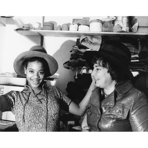 A High School Student Tries On One Of Bella Abzug'S Wide Brimmed Campaign Hats. Congresswomen-Elect Abzug Donated The