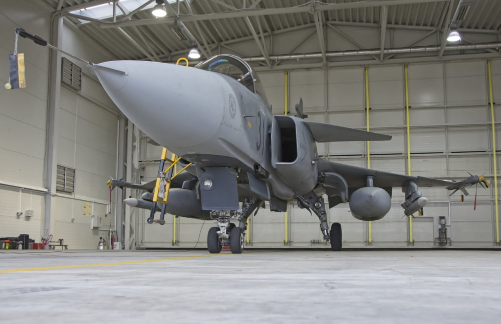 A Hungarian Air Force JAS-39 Gripen in the hangar Canvas Art - Giovanni CollaStocktrek Images (18 x 12)