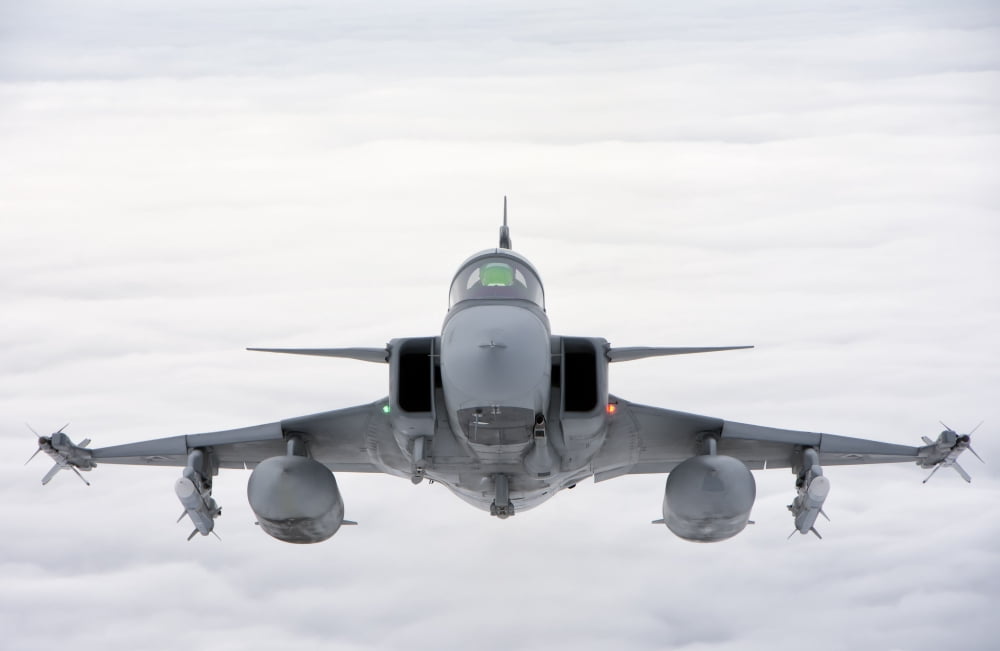 A Hungarian Air Force JAS-39 Gripen over Lithuania Canvas Art - Giovanni CollaStocktrek Images (34 x 23)