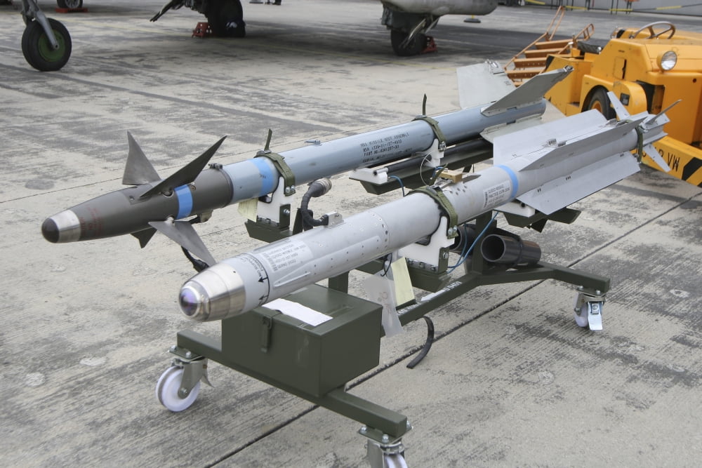 A IRIS-T air-to-air missile compared to an AIM-9 Sidewinder Canvas Art - Timm ZiegenthalerStocktrek Images (18 x 12)