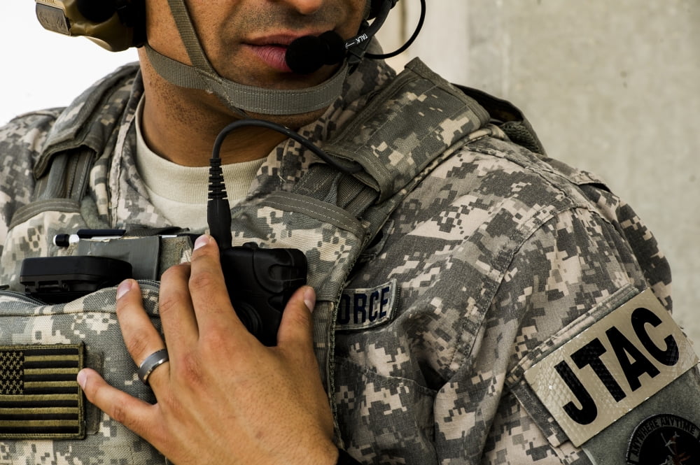 A Joint Terminal Attack Controller talks on his radio Canvas Art - Stocktrek Images (34 x 23)