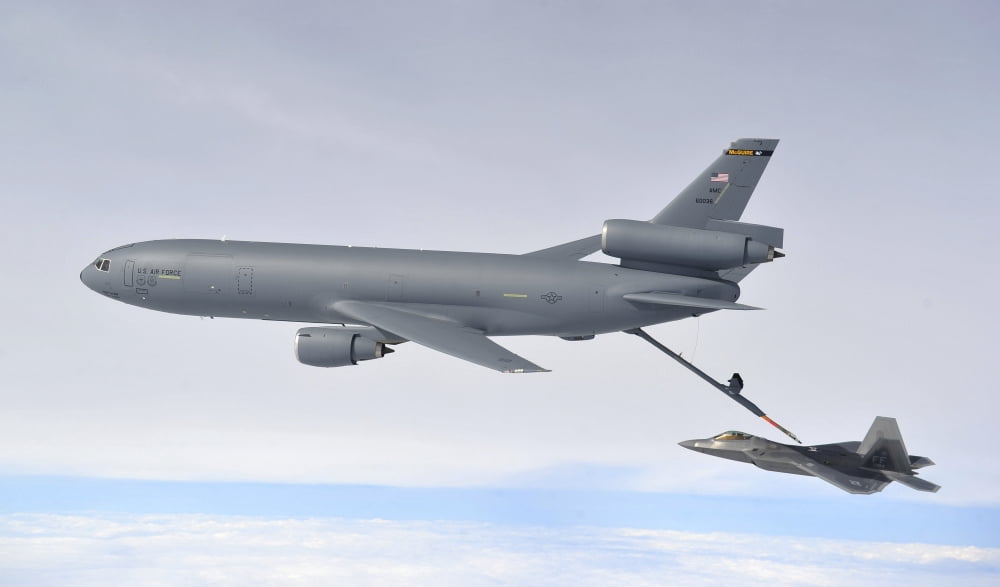 A KC-10 Extender refuels an F-22 Raptor Canvas Art - Stocktrek Images (36 x 22)
