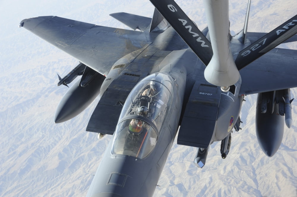 A KC-135 Stratotanker refuels an F-15E Strike Eagle Canvas Art - Stocktrek Images (35 x 24)