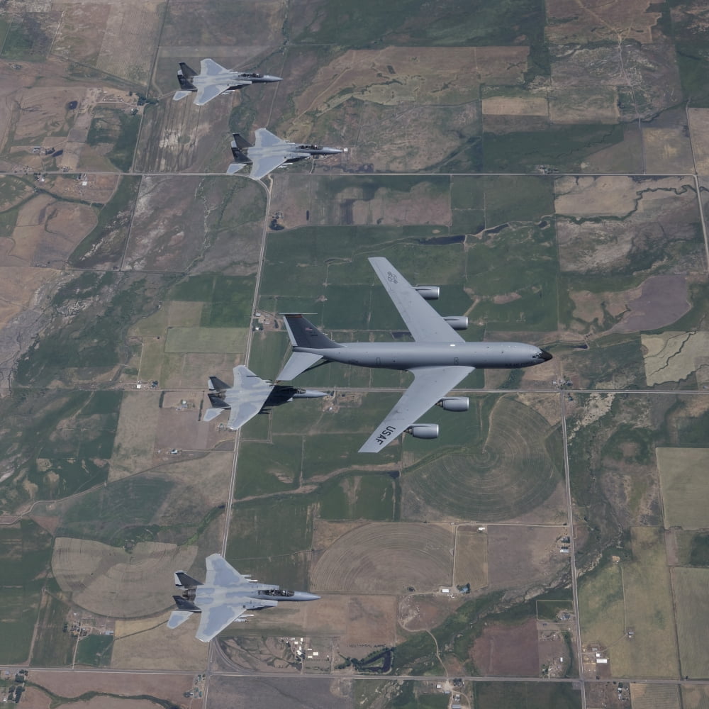 A KC-135R Stratotanker refuels four F-15 Eagles over Oregon Canvas Art - HIGH-G ProductionsStocktrek Images (28 x 28)