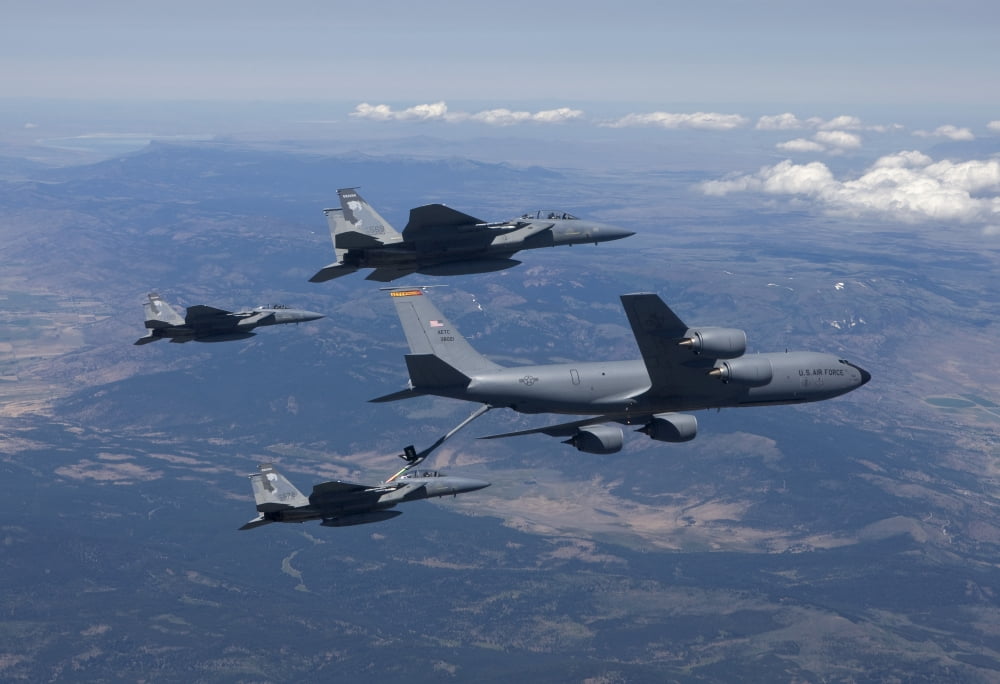 A KC-135R Stratotanker refuels three F-15 Eagles Canvas Art - HIGH-G ProductionsStocktrek Images (18 x 12)