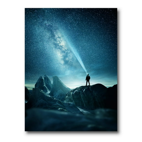 A Light Shining by A Man Shining Into The Night Sky 12 in x 8 in Photography Canvas Art Print, by Designart