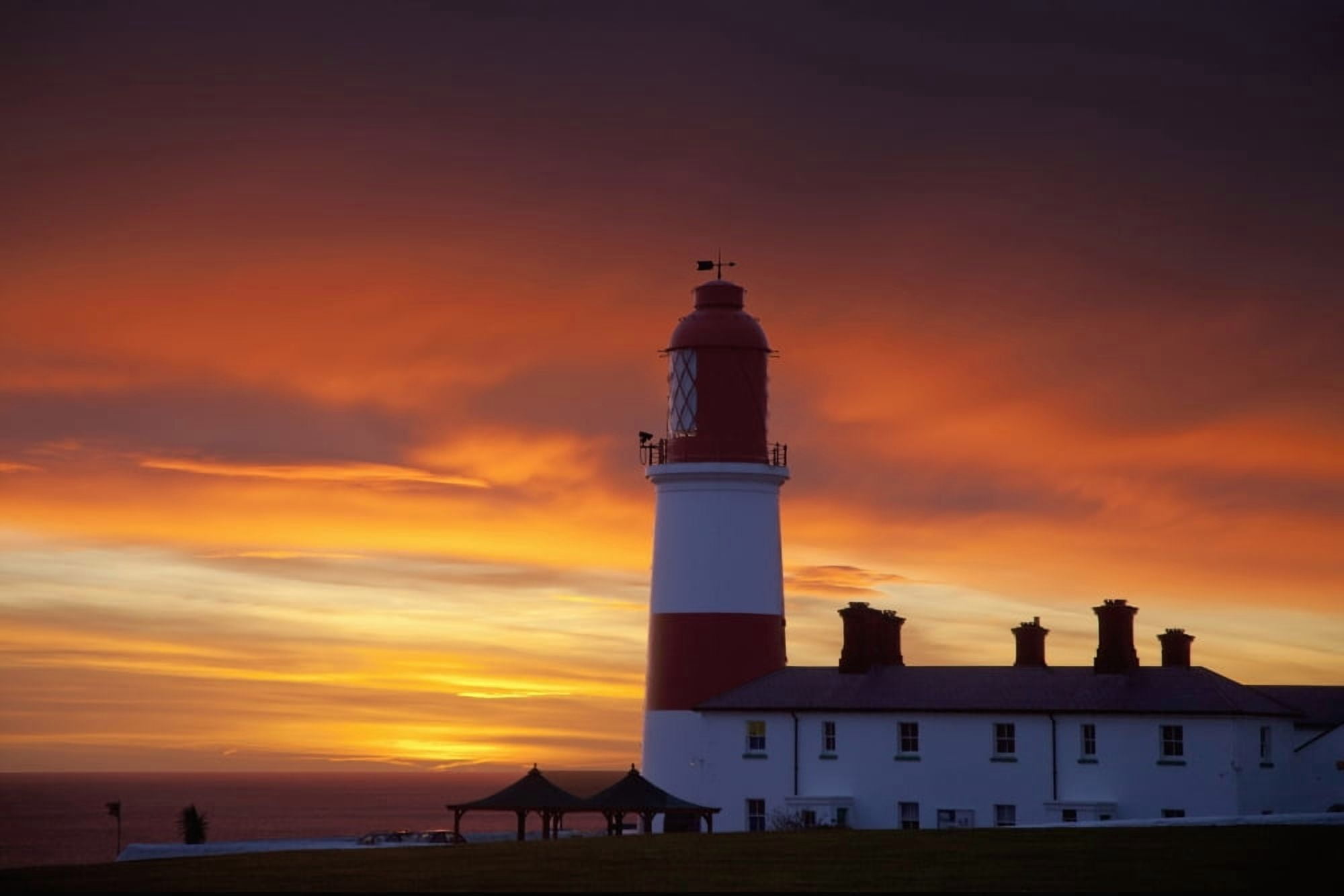 A Lighthouse At Sunset Whitburn Tyne And Wear England Canvas Art - John Short Design Pics (19 x 12)