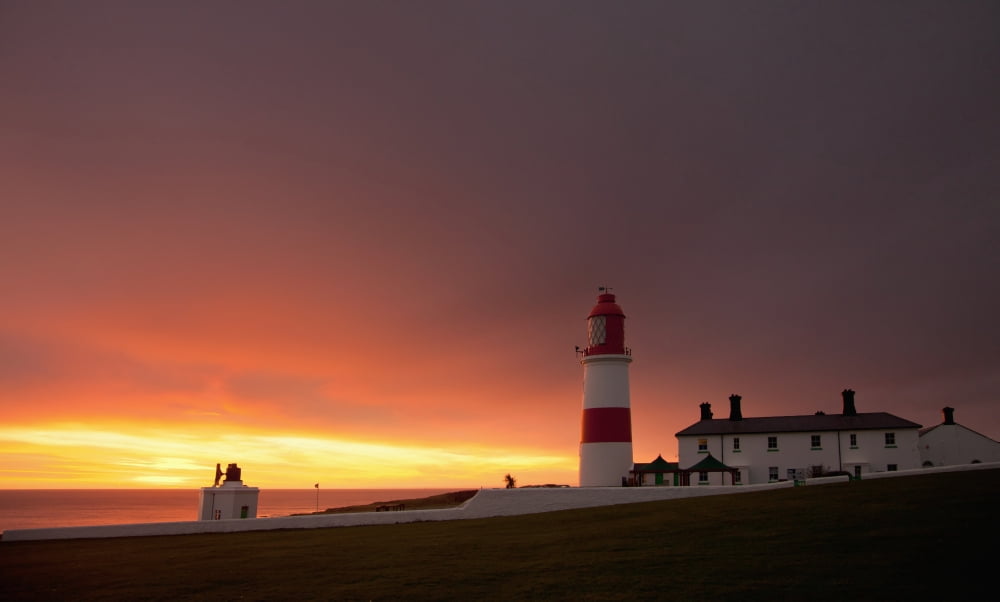 A Lighthouse On The Coast At Sunset Whitburn Tyne And Wear England Canvas Art - John Short Design Pics (20 x 12)