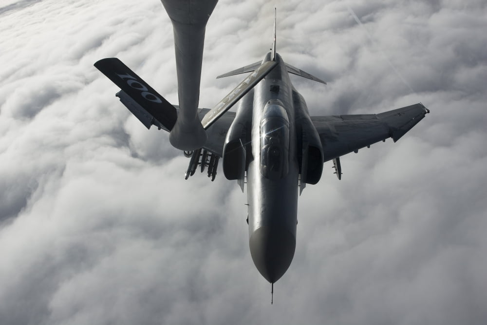 A Luftwaffe F-4F Phantom II approaches a tanker for refueling Canvas Art - Gert KromhoutStocktrek Images (35 x 23)