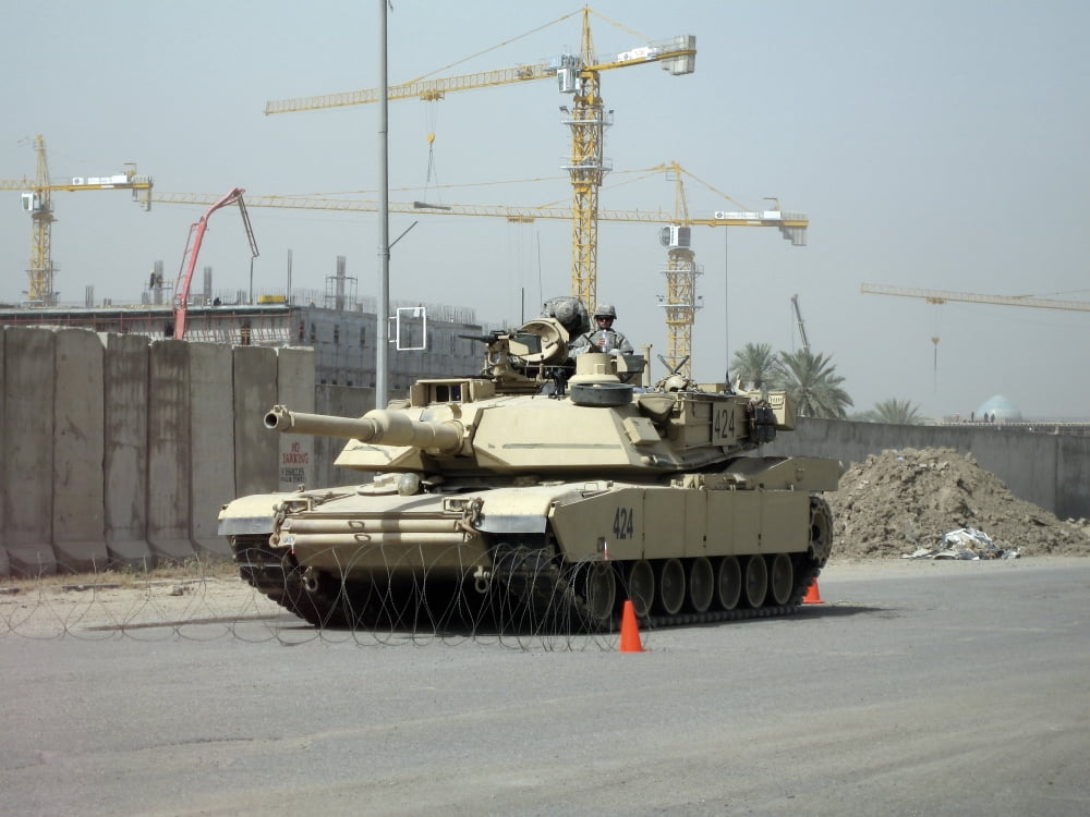 A M1 Abram sits out front of the New United States Embassy in Baghdad Iraq Canvas Art - Terry MooreStocktrek Images (17 x 13)