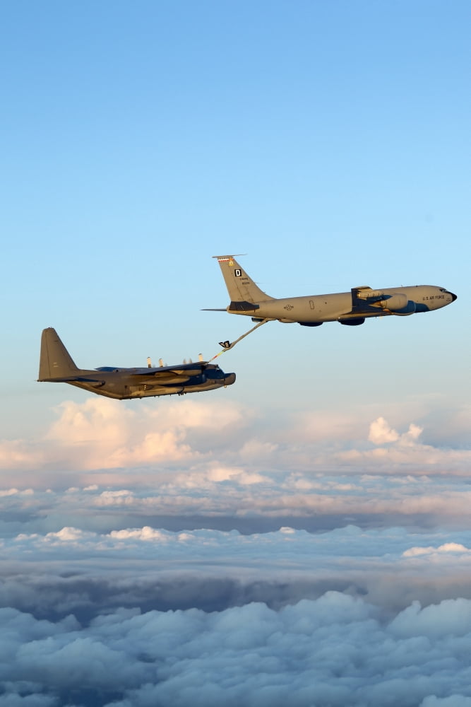 A MC-130H Combat Talon II being refueled by a KC-135R Stratotanker Canvas Art - Gert KromhoutStocktrek Images (12 x 18)