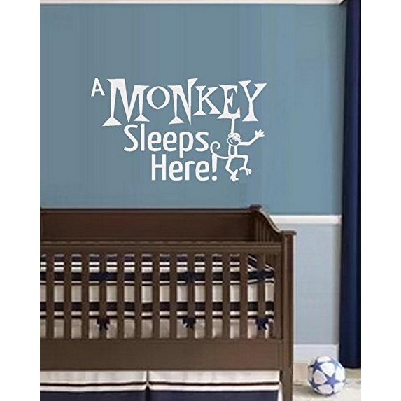 A MONKEY SLEEPS HERE: Wall or Window Decal 13" x 22" (White)