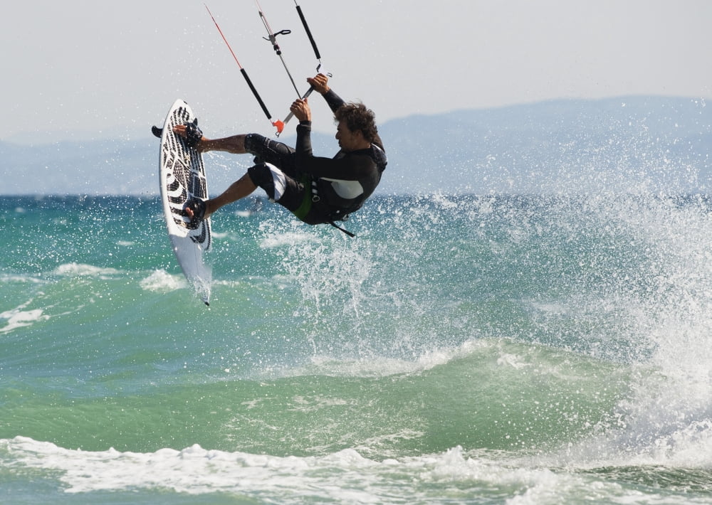 A Man Kitesurfing Off Dos Mares Beach In Front Of Hotel Dos Mares Tarifa Cadiz Andalusia Spain Canvas Art - Ben Welsh Design Pics (18 x 13)