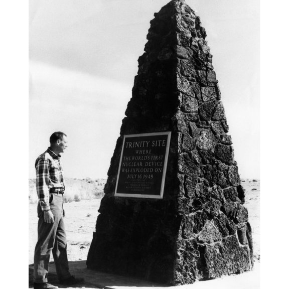 A Man Reading The Plaque On A Monument At The Trinity Site History (18 x 24)