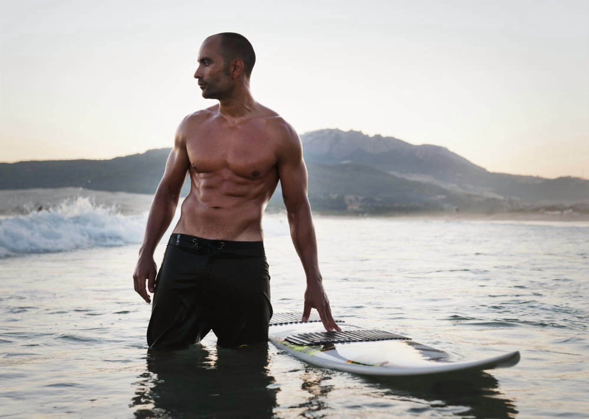 A Man Standing In The Water With His Surfboard Off Valdevaqueros Beach Tarifa Cadiz Andalusia Spain Canvas Art - Ben Welsh Design Pics (18 x 13)