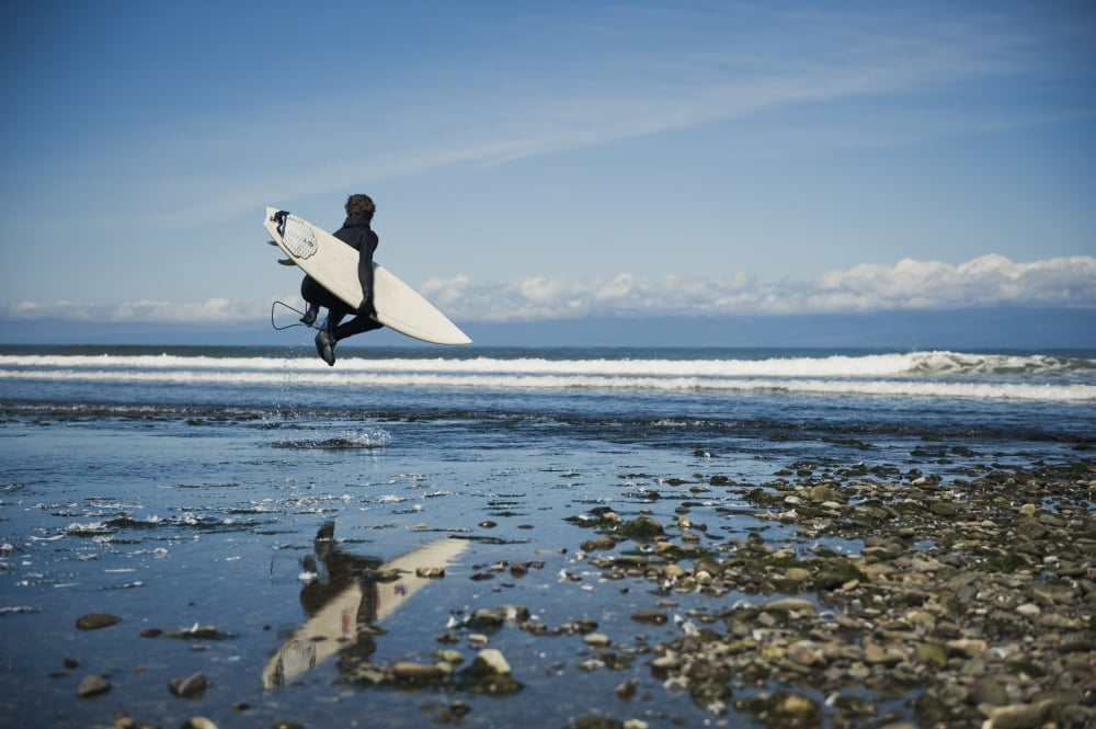 A Man Walks With His Surfboard Down The Beach Washington Peninsula Washington United States Of America Canvas Art - Helene Cyr Design Pics (19 x 12)