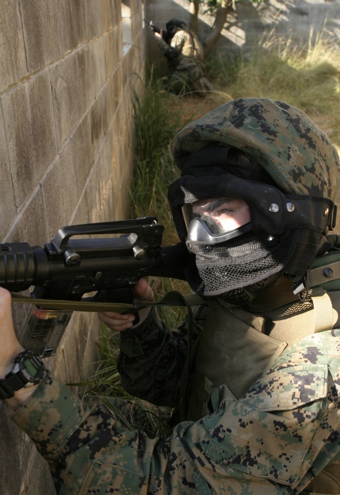 A Marine provides security Canvas Art - Stocktrek Images (23 x 33)