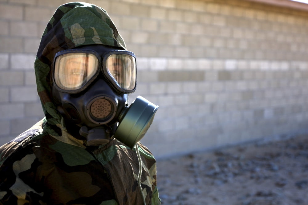 A Marine wearing a gas mask after completion of the confidence chamber Canvas Art - Stocktrek Images (34 x 23)