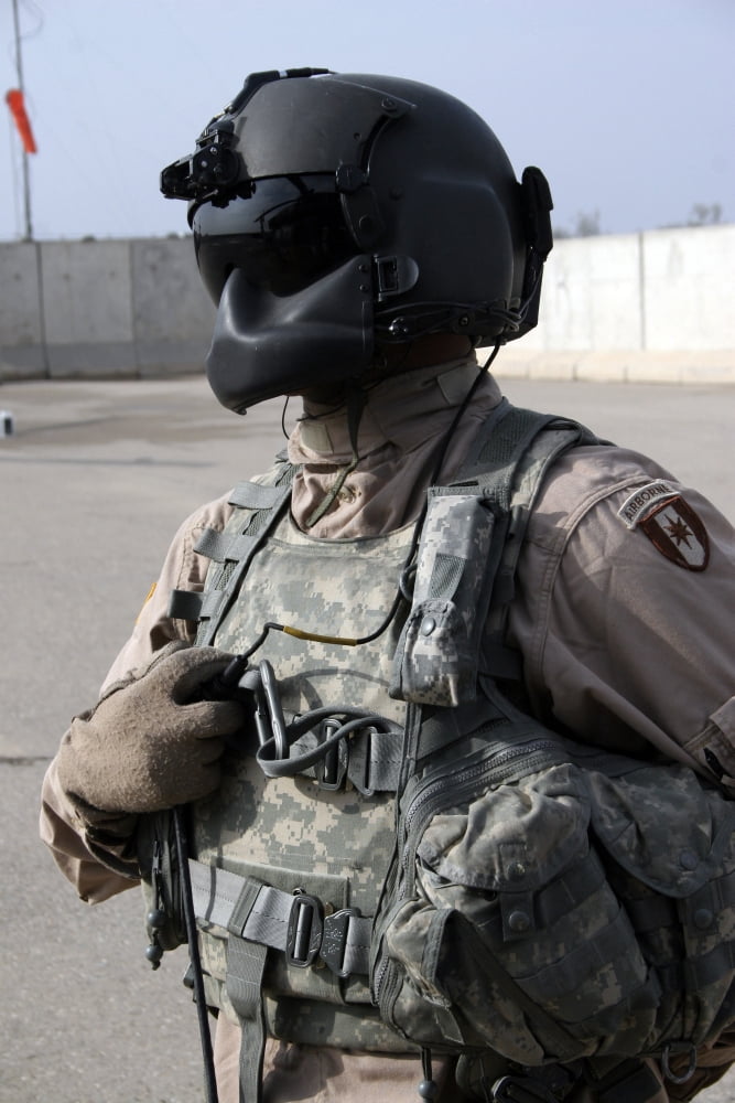 A Medivac Loadmaster waits as the pilots run through their pre-flight checks Canvas Art - Terry MooreStocktrek Images (23 x 35)