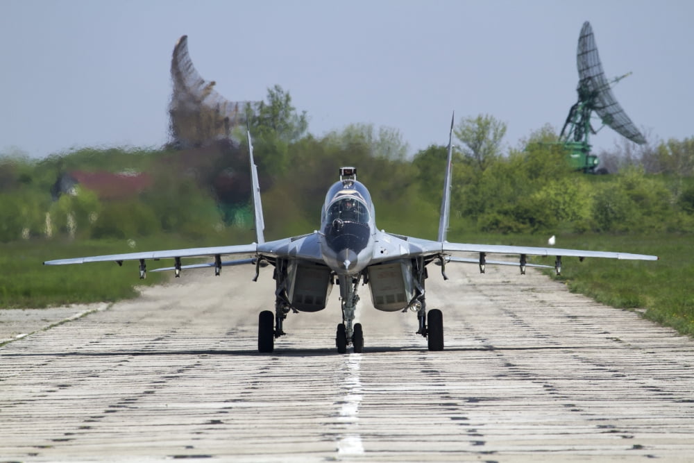A MiG-29UB of the Bulgarian Air Force on the runway at Balchik Air Base Canvas Art - Anton BalakchievStocktrek Images (35 x 23)