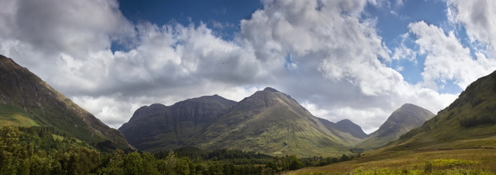 A Mountainous Landscape Under Clouds Glencoe Argyll Scotland Canvas Art - John Short Design Pics (44 x 15)