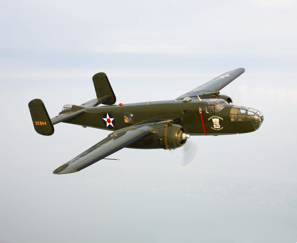 A North American B-25 Mitchell in flight Canvas Art - Scott GermainStocktrek Images (16 x 13)