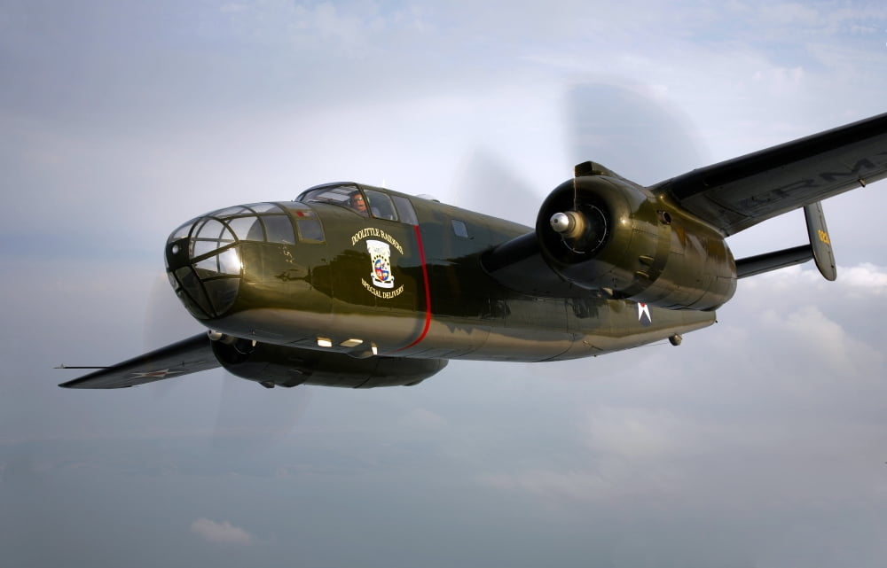 A North American B-25 Mitchell in flight Canvas Art - Scott GermainStocktrek Images (18 x 12)